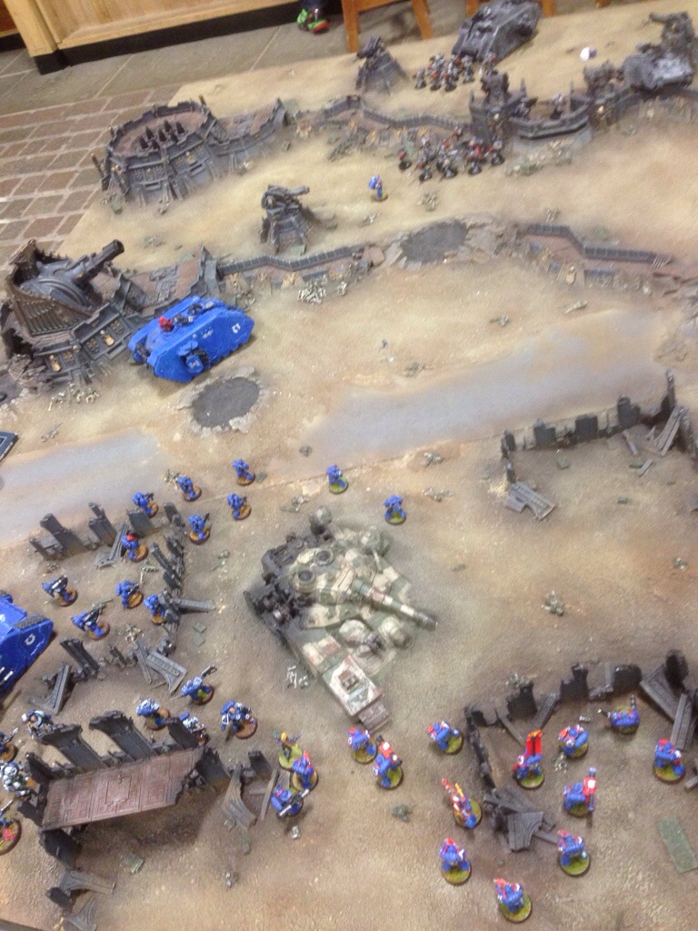 The assassin contests the objective next to the Baneblade